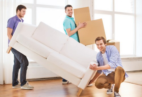 Local packing team organising boxes room by room in Hounslow